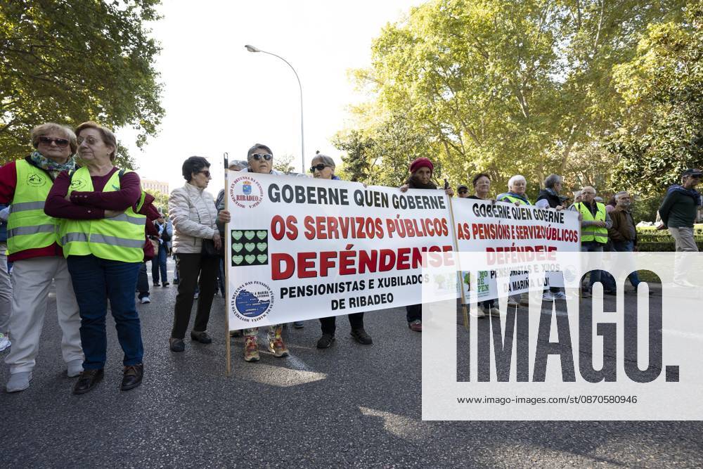 Several people carrying signs in favor of public pensions take part in a demonstration supporting the public pension system and access to housing in Madrid, Spain. Madrid Spain - ZUMAs197 20261024_aaa_s197_065