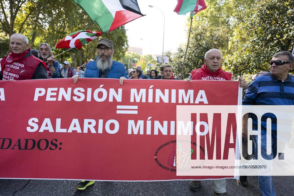 Several people carrying signs in favor of public pensions take part in a demonstration supporting the public pension system and access to housing in Madrid, Spain. Madrid Spain - ZUMAs197 20261024_aaa_s197_066