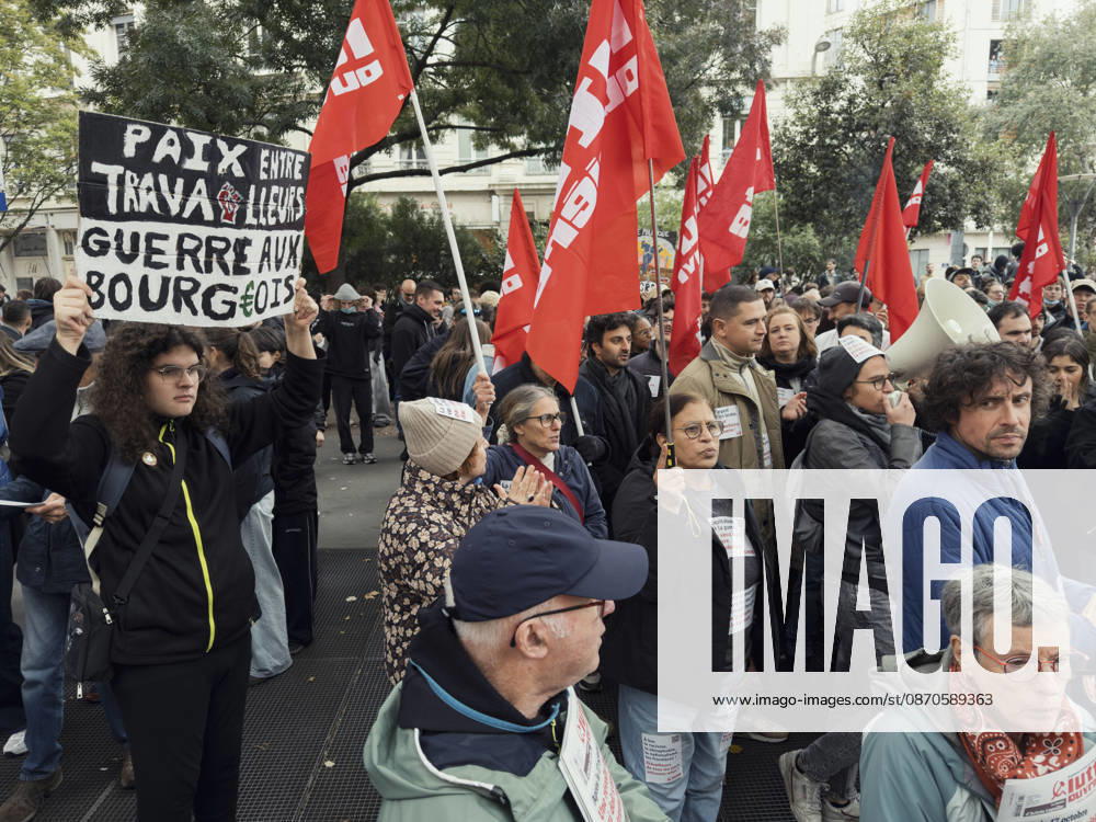Lyon France Anti-Government Protest Demonstrators carry red union flags during a street protest in Lyon, France, on October 24, 2026. The demonstration took place amid renewed protests over living costs, wages and public services, while authorities restricted gatherings in parts of central Lyon following unrest during demonstrations the previous weekend. Lyon Rhone Alpes France
