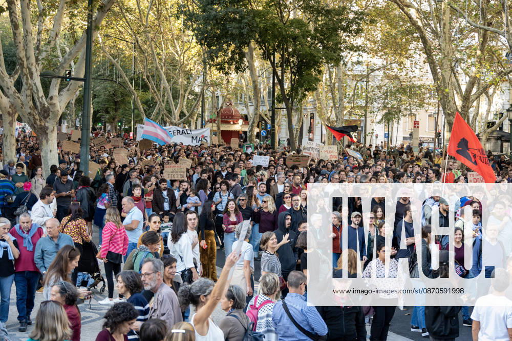 Demonstrators take part in a protest organized by the Acampada de Lisboa housing movement, demanding affordable housing, limits on rising rents and an end to property speculation. The march takes place in central Lisbon, from Marques de Pombal to Rossio Square, following recent police removal of protest tents and the detention of 55 demonstrators during housing protests in the Portuguese capital. Lisbon Portugal - ZUMAr238 20261024_zip_r238_071