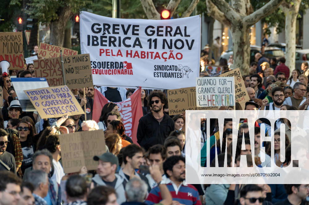 Demonstrators take part in a protest organized by the Acampada de Lisboa housing movement, demanding affordable housing, limits on rising rents and an end to property speculation. The march takes place in central Lisbon, from Marques de Pombal to Rossio Square, following recent police removal of protest tents and the detention of 55 demonstrators during housing protests in the Portuguese capital. Lisbon Portugal - ZUMAr238 20261024_zip_r238_072