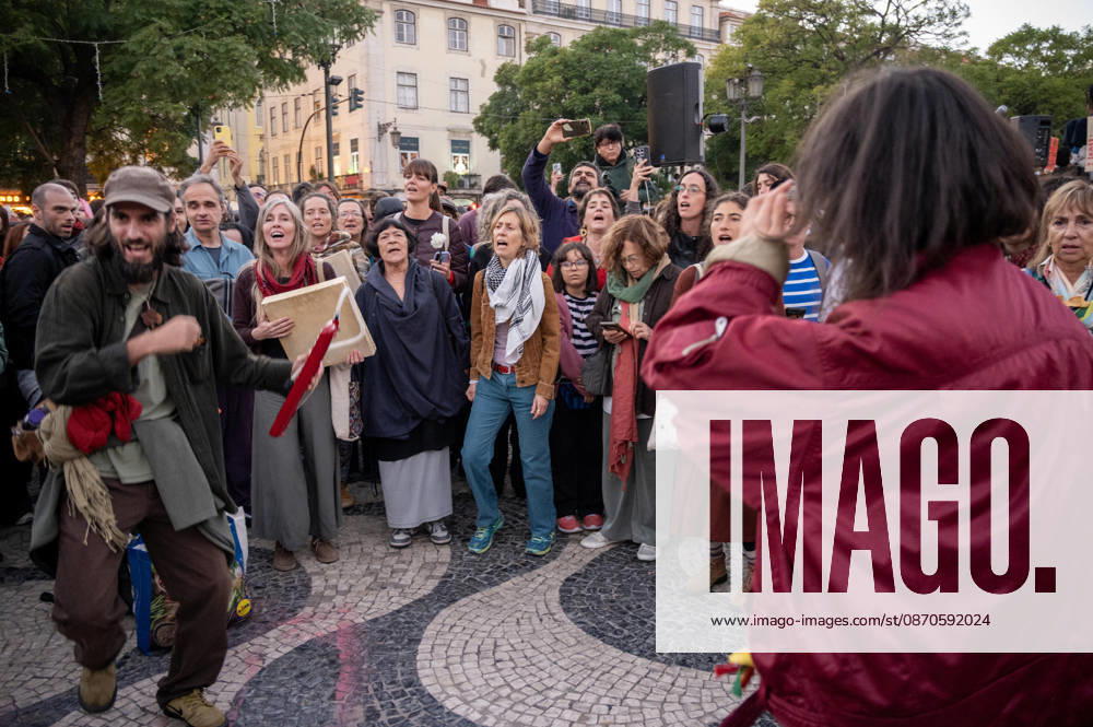 Demonstrators take part in a protest organized by the Acampada de Lisboa housing movement, demanding affordable housing, limits on rising rents and an end to property speculation. The march takes place in central Lisbon, from Marques de Pombal to Rossio Square, following recent police removal of protest tents and the detention of 55 demonstrators during housing protests in the Portuguese capital. Lisbon Portugal - ZUMAr238 20261024_zip_r238_075