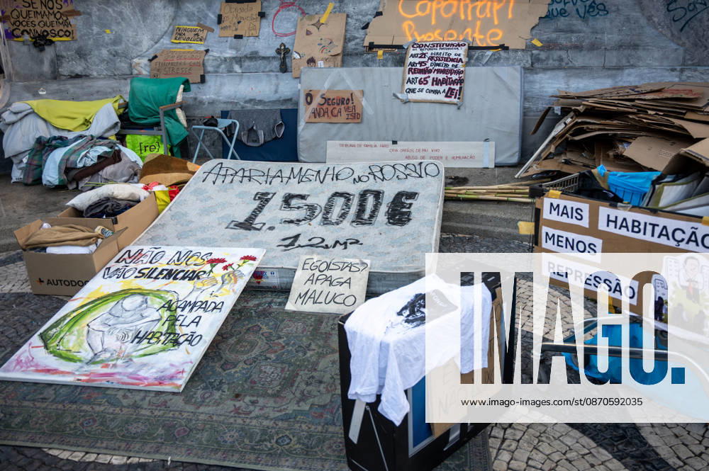 Demonstrators take part in a protest organized by the Acampada de Lisboa housing movement, demanding affordable housing, limits on rising rents and an end to property speculation. The march takes place in central Lisbon, from Marques de Pombal to Rossio Square, following recent police removal of protest tents and the detention of 55 demonstrators during housing protests in the Portuguese capital. Lisbon Portugal - ZUMAr238 20261024_zip_r238_077