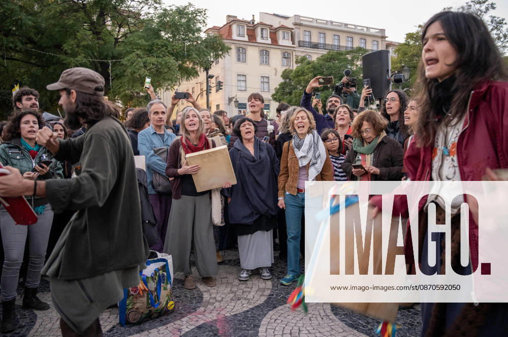 Demonstrators take part in a protest organized by the Acampada de Lisboa housing movement, demanding affordable housing, limits on rising rents and an end to property speculation. The march takes place in central Lisbon, from Marques de Pombal to Rossio Square, following recent police removal of protest tents and the detention of 55 demonstrators during housing protests in the Portuguese capital. Lisbon Portugal - ZUMAr238 20261024_zip_r238_080