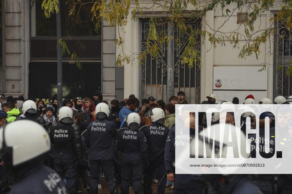 Brussels Belgium Education Protest Police officers stand guard as demonstrators gather on a street in Brussels, Belgium on October 24, 2026. Police officers stand guard on a street in Brussels, Belgium on October 24, 2026. Hundreds of mainly young protesters gathered in Brussels to demand more funding for education and public services. Demonstrators further criticized police conduct, accusing officers of excessive force during previous rallies. Brussels Brussels Capital Belgium