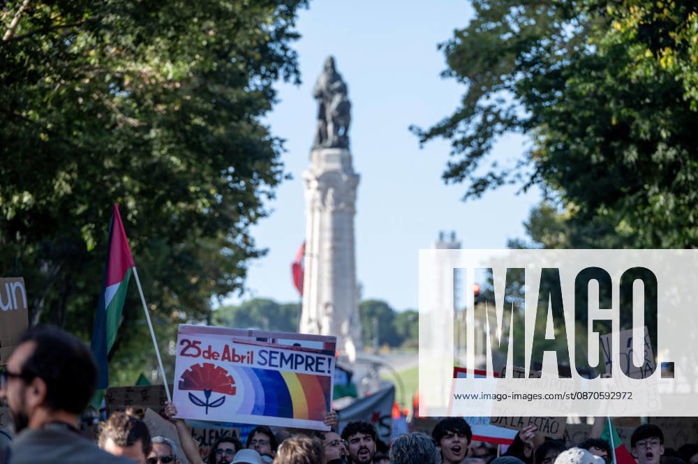 Demonstrators take part in a protest organized by the Acampada de Lisboa housing movement, demanding affordable housing, limits on rising rents and an end to property speculation. The march takes place in central Lisbon, from Marques de Pombal to Rossio Square, following recent police removal of protest tents and the detention of 55 demonstrators during housing protests in the Portuguese capital. Lisbon Portugal - ZUMAr238 20261024_zip_r238_026