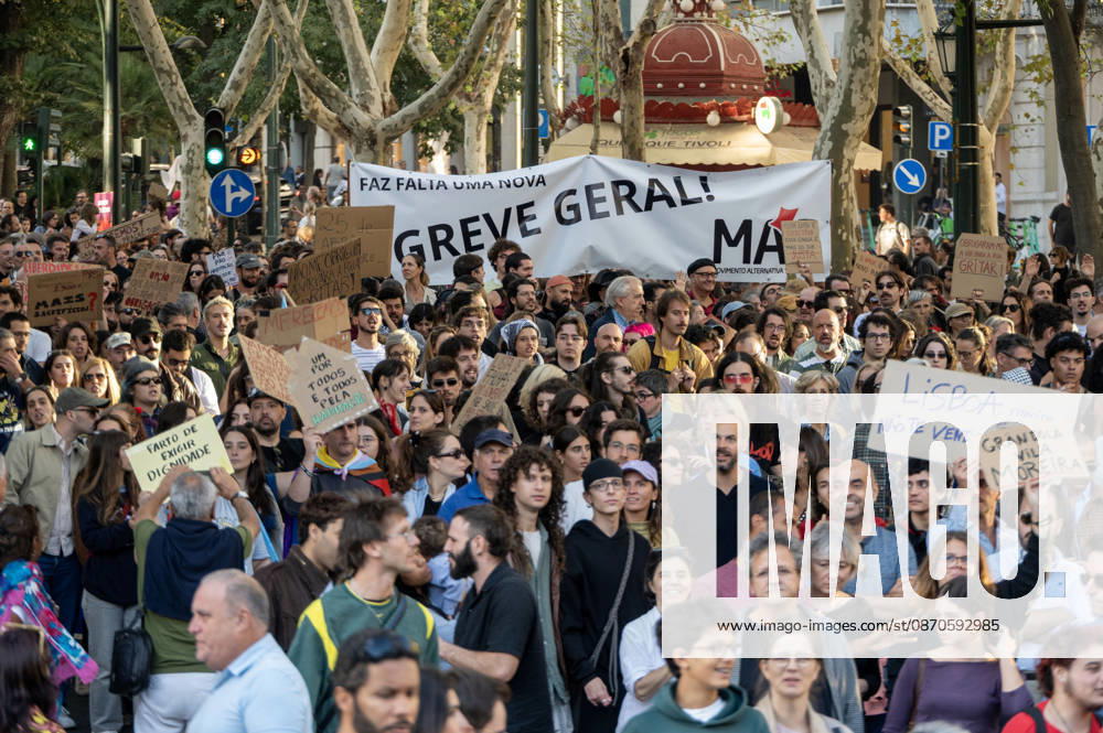 Demonstrators take part in a protest organized by the Acampada de Lisboa housing movement, demanding affordable housing, limits on rising rents and an end to property speculation. The march takes place in central Lisbon, from Marques de Pombal to Rossio Square, following recent police removal of protest tents and the detention of 55 demonstrators during housing protests in the Portuguese capital. Lisbon Portugal - ZUMAr238 20261024_zip_r238_039