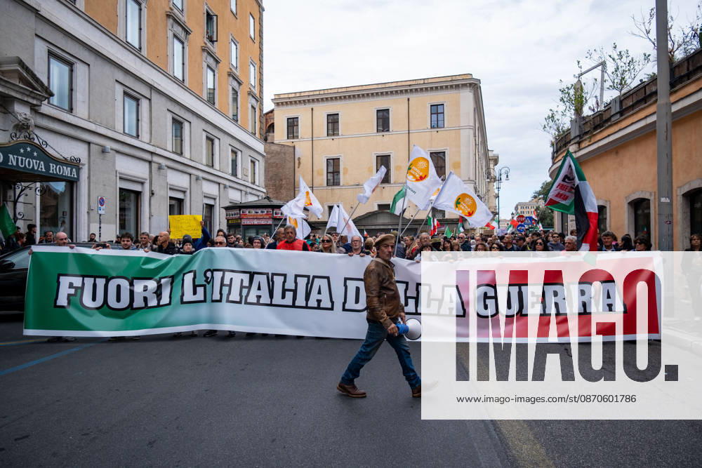 Thousands of people take to the streets to join the Get Italy out of the war march. Participants are calling for peace and protesting against the rising cost of living. Get Italy out of the war reads the banner. Rome Italy - ZUMAg256 20261024_znp_g256_001