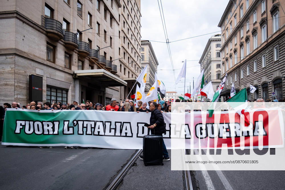 Thousands of people take to the streets to join the Get Italy out of the war march. Participants are calling for peace and protesting against the rising cost of living. Get Italy out of the war reads the banner. Rome Italy - ZUMAg256 20261024_znp_g256_011