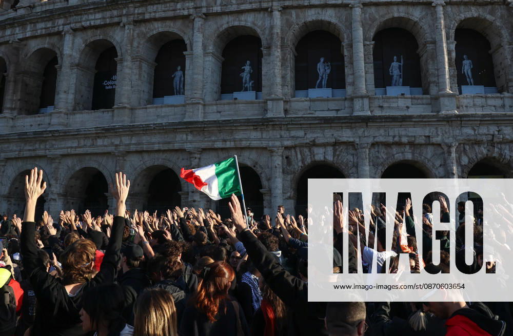 (261024) -- ROME, Oct. 24, 2026 -- Demonstrators march past the Colosseum during an anti-war march in Rome, Italy, Oct. 24, 2026. Protests over rising living costs, military expansion and increased arms spending swept across several Italian cities on Saturday, with clashes between demonstrators and police reported in multiple locations. In Rome, demonstrators set off from Piazza della Repubblica, according to the ANSA news agency. Clashes erupted between protesters and police in the city center later in the evening, prompting police to use water cannons and tear gas in an attempt to disperse the crowds. ) ITALY-ROME-PROTESTS WangxKaiyan