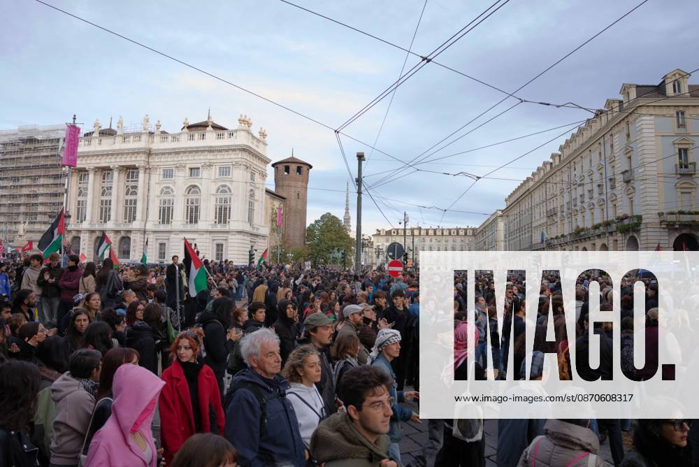 Turin Protesters Clash With Police TURIN, ITALY, OCTOBER 24, 2026: Riot police use water cannons and tear gas during confrontations with demonstrators protesting against military rearmament, rising living costs and government policies in Turin. The march begins in Piazza Castello before moving towards northern districts, with clashes occurring as police block protesters from entering streets leading towards the city centre. Turin IT