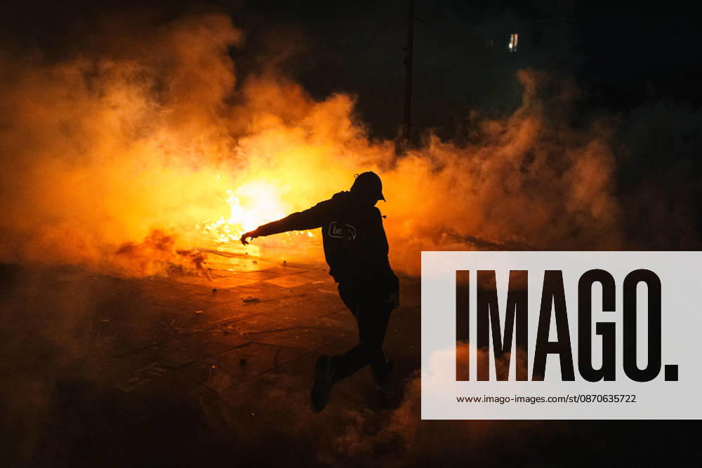 Marseille France Street Protests A demonstrator moves amid smoke during a protest in Marseille, France on October 24, 2026. Authorities deployed around 70,000 security personnel across France for renewed protests over the cost of living, after unrest a week earlier saw public buildings damaged, hundreds of shops looted and about 2,700 people arrested. Marseille Provence-Alpes-CÃ te France