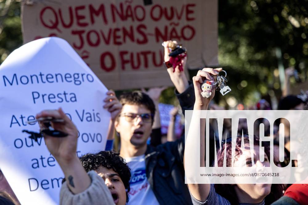 Protesters hold up signs and shout slogans during a protest for affordable housing and against the rising cost of living..Thousands of people protested for access to affordable housing and against the rising cost of living. The demonstration ended in Rossio Square, with protesters setting up tents as a symbol of the housing shortage in Portugal. Lisbon Portugal - ZUMAs197 20261024_aaa_s197_194