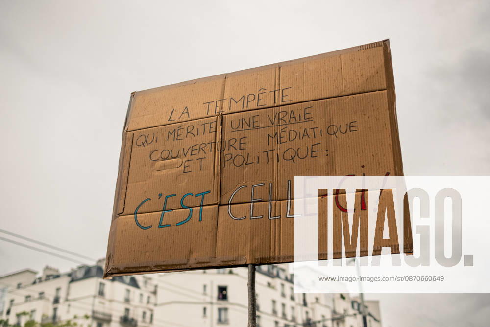 Yellow Vests Protest Act II - Paris Demonstrators carry placards displaying political messages during a march against the rising cost of living and for social justice in Paris, France, on October 24, 2026. The protest follows the boulevards des Maréchaux from Porte d’Italie to Porte de Vincennes, with calls for higher wages and better funding for public services and education. Photo by Jules Bernard ABACAPRESS.COM Paris Île-de-France France