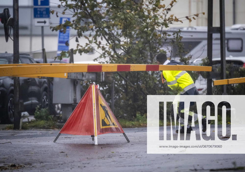 YSTAD, October 25, 2026—Staff are setting up barriers at the railroad crossing gates, which became stuck in the lowered position at the port of Ystad due to strong winds as Storm Boelo swept across southern Sweden on Sunday. YSTAD, SWEDEN