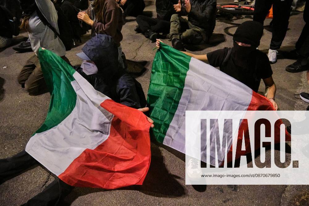 Thousands of people gathered spontaneously in Piazza del Nettuno before setting off in a march through the city centre. Clashes broke out along Via Marconi. Several people were injured, and a young man lost consciousness after being tackled by police. A police water cannon was also used from behind the protesters and hit the ambulance that was assisting the unconscious man. In protest, demonstrators sat down in front of the police line, which, after several minutes, decided to disband its wall of shields. Bologna Italy