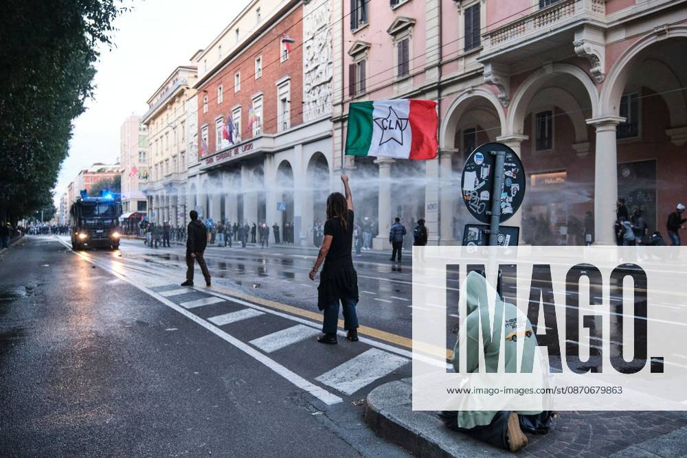 Thousands of people gathered spontaneously in Piazza del Nettuno before setting off in a march through the city centre. Clashes broke out along Via Marconi. Several people were injured, and a young man lost consciousness after being tackled by police. A police water cannon was also used from behind the protesters and hit the ambulance that was assisting the unconscious man. In protest, demonstrators sat down in front of the police line, which, after several minutes, decided to disband its wall of shields. Bologna Italy