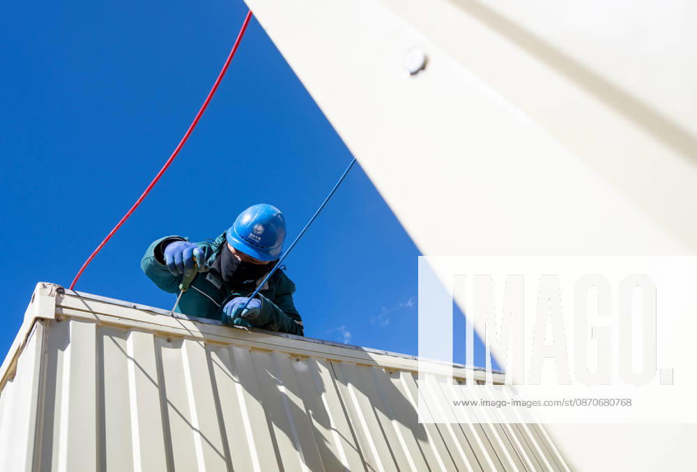 (261025) -- BAQEN, Oct. 25, 2026 -- An electric worker installs power supply lines at a resettlement site of a quake-hit village in Maru Township of Baqen County, Nagqu City, southwest China s Xizang Autonomous Region, Oct. 25, 2026. Power supply lines are being installed for prefabricated houses in the quake-hit Baqen County. According to the State Grid, power connection supplies for 2,724 tents and 2,400 prefabricated houses have been deployed to meet electricity connection needs in the quake-hit area. ) CHINA-XIZANG-EARTHQUAKE-POWER SUPPLY LINES (CN) TenzinxNyida