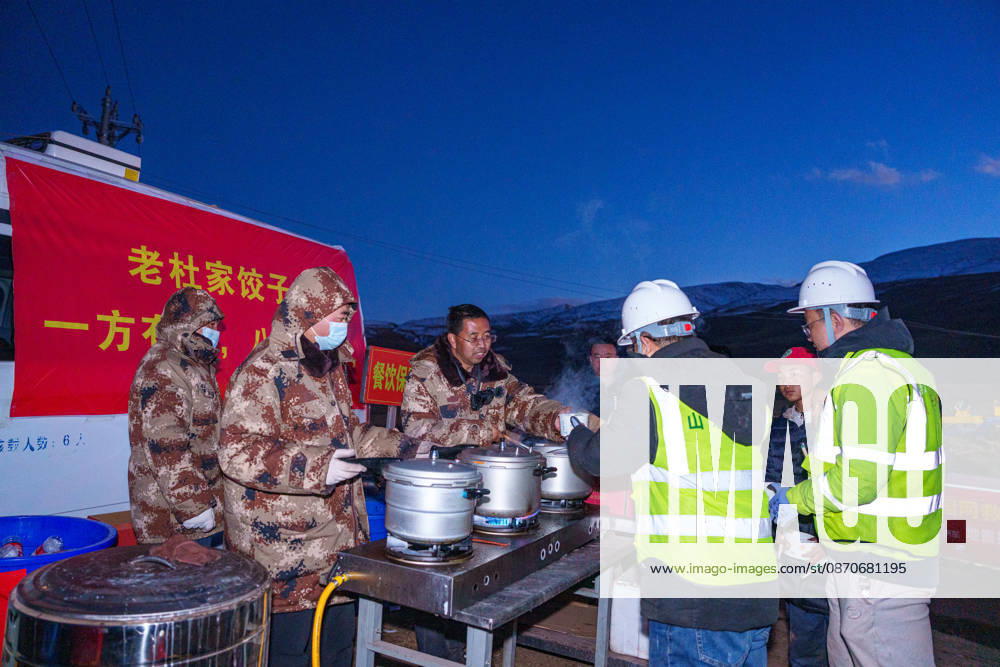 (261025) -- BAQEN, Oct. 25, 2026 -- Du Guoping (3rd L) distributes dumplings to rescuers at a temporary shelter in Maru Township of Baqen County, Nagqu City, southwest China s Xizang Autonomous Region, Oct. 24, 2026. After a 7.0-magnitude earthquake struck Baqen County in Nagqu, southwest China s Xizang Autonomous Region, on Thursday, Du Guoping, owner of a dumpling restaurant in Xigaze, postponed the opening of his two new restaurants and headed to the disaster zone with his staff. It took only about 10 minutes to make the decision that we would go to Baqen and cook dumplings for earthquake-affected residents, Du said. The team loaded more than 1,500 kilograms of dumplings onto vehicles and set off from Xigaze at midnight on the nig
