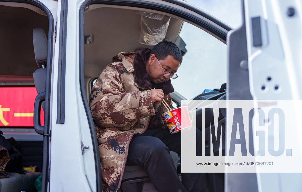 (261025) -- BAQEN, Oct. 25, 2026 -- Du Guoping eats instant noodles at a temporary shelter in Maru Township of Baqen County, Nagqu City, southwest China s Xizang Autonomous Region, Oct. 24, 2026. After a 7.0-magnitude earthquake struck Baqen County in Nagqu, southwest China s Xizang Autonomous Region, on Thursday, Du Guoping, owner of a dumpling restaurant in Xigaze, postponed the opening of his two new restaurants and headed to the disaster zone with his staff. It took only about 10 minutes to make the decision that we would go to Baqen and cook dumplings for earthquake-affected residents, Du said. The team loaded more than 1,500 kilograms of dumplings onto vehicles and set off from Xigaze at midnight on the night of the earthquake.