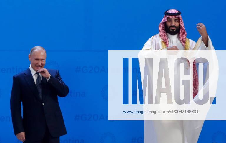 Russia s President Vladimir Putin (L) and Crown Prince of Saudi Arabia Mohammed bin Salman al Saud pose for a group photo at the 2018 G20 Leaders Summit. Mikhail Metzel TASS TS09965C