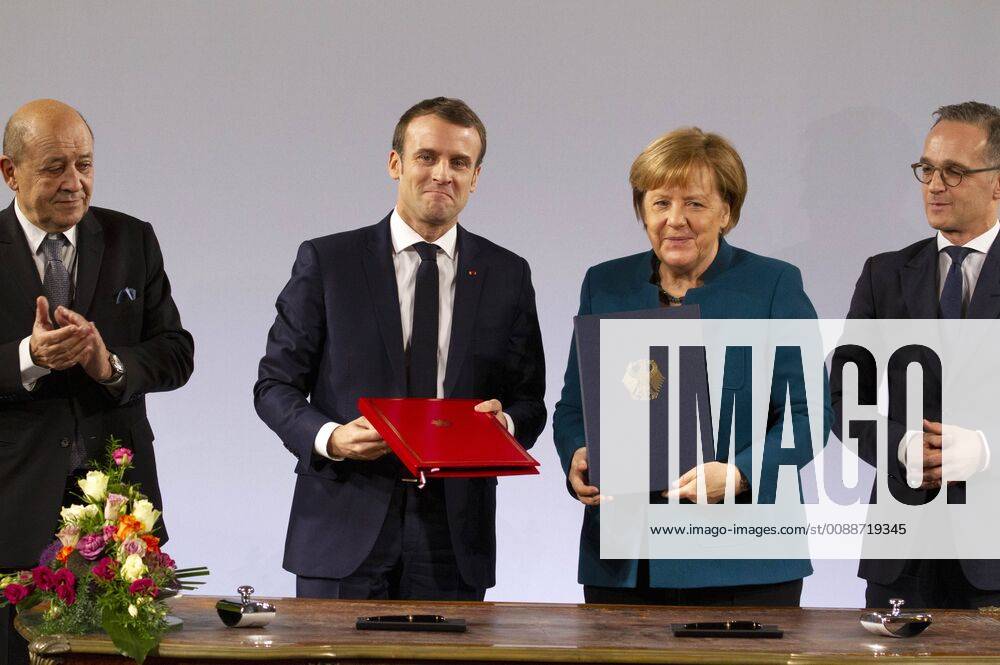 Jean-Yves Le Drian, Emmanuel Macron, Angela Merkel und Heiko Maas bei der Erneuerung des deutsch-französischen Freundschaftsvertrages im Rathaus. Aachen