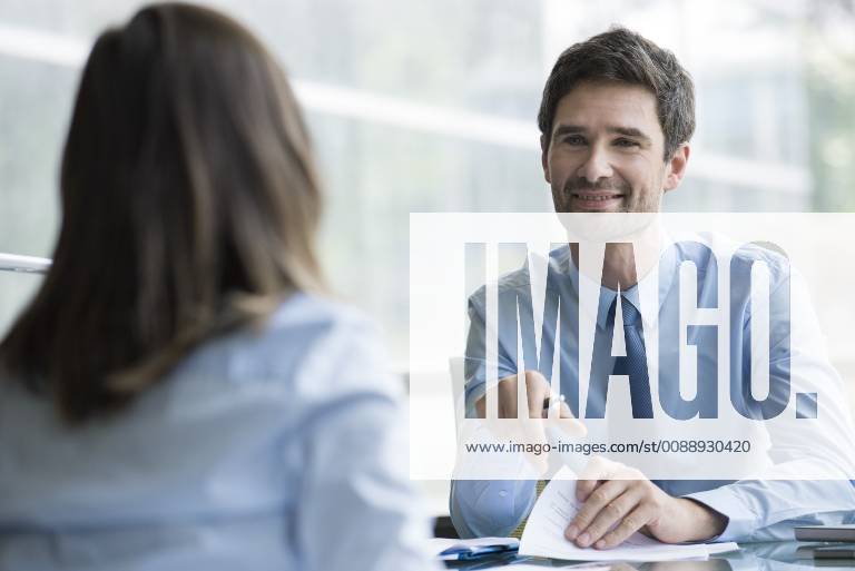Insurance agent meeting with prospective customer