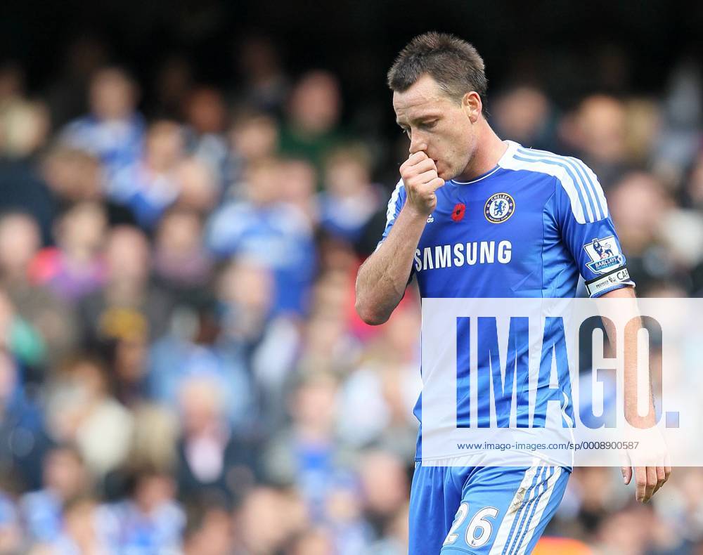 Chelseas John Terry looks on dejected after his mistake led to the winning goal Barclays Premier League FC Chelsea London vs FC Arsenal London 29th October, 2011 .
