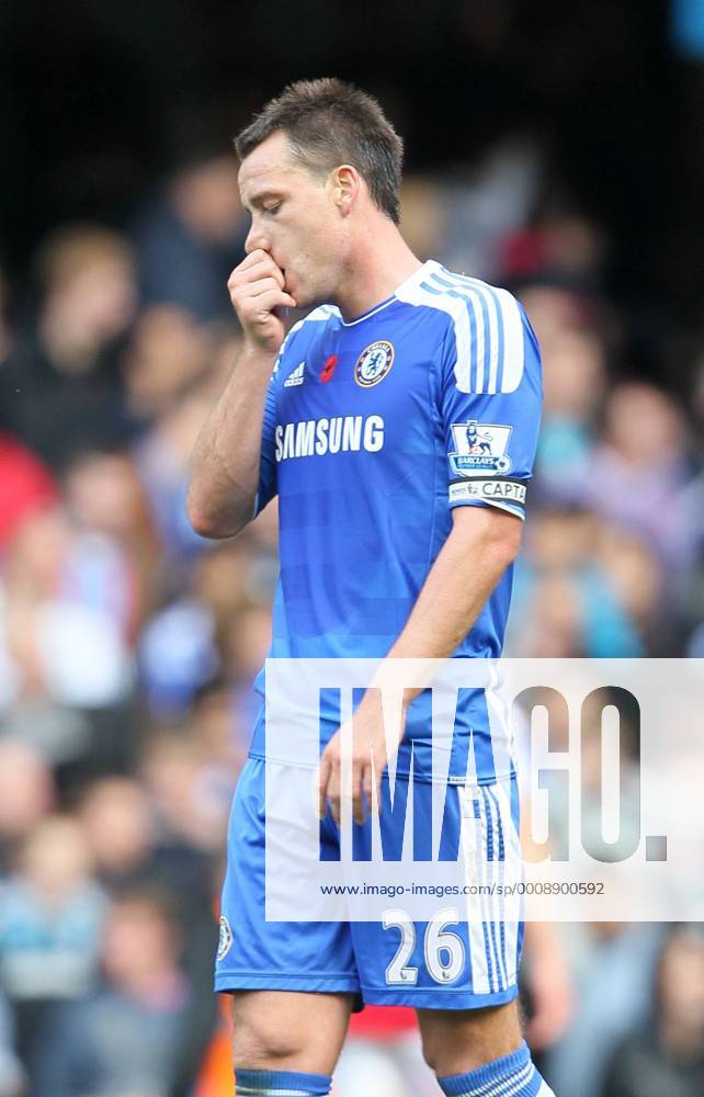 Chelseas John Terry looks on dejected after his mistake led to the winning goal Barclays Premier League FC Chelsea London vs FC Arsenal London 29th October, 2011 .