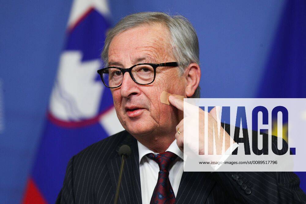 (190220) -- BRUSSELS, Feb. 20, 2019 -- European Commission President Jean-Claude Juncker points to a Band-Aid on his face during a press conference at the EU headquarters in Brussels, Belgium, on Feb. 20, 2019. ) BELGIUM-BRUSSELS-EU-JUNCKER-PRESS CONFERENCE ZhengxHuansong