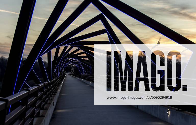 Madrid, Iowa, U.S. - Originally a conduit for rail freight, but now a decomissioned railroad line, the High Trestle Trail Bridge is part of the 25-mile Trestle Trail path for bikers, hikers and horseback riders. The artistic, spiral steel frames springing up from the road bed are a nod to the shape of the timbers placed in former central Iowa coal mines. Madrid U.S. - ZUMAce6_ 20190322_zaf_ce6_001