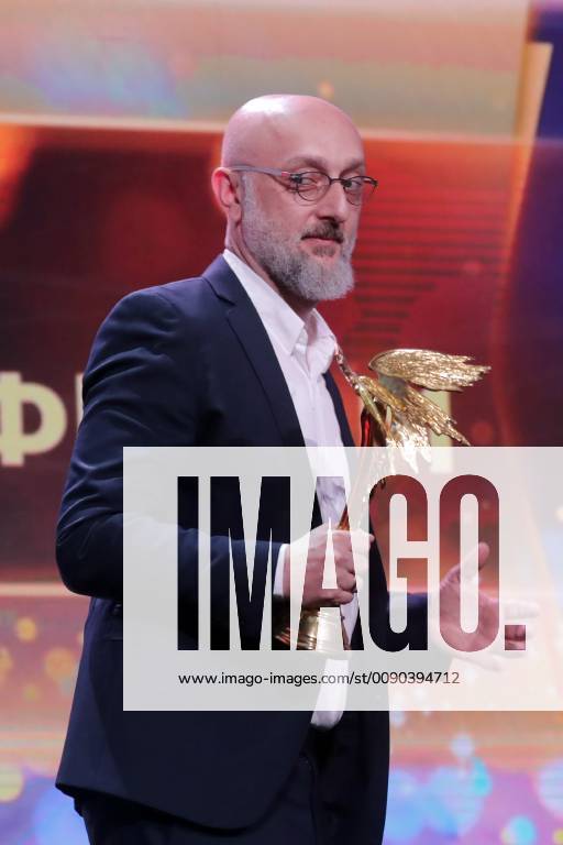 MOSCOW, RUSSIA – MARCH 30, 2019: Director Levan Leo Gabriadze accepts an award for Best Animated Film for his animated documentary film Rezo at the 32nd Nika Film Award Ceremony. Vyacheslav Prokofyev TASS TS0A6701