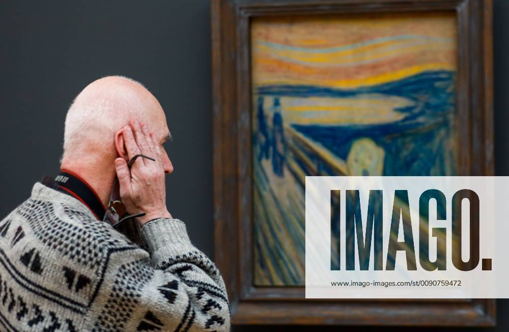 MOSCOW, RUSSIA – APRIL 15, 2019: A visitor looks at The Scream by Norwegian artist Edvard Munch at an exhibition of Munch s works at the Tretyakov Gallery. Mikhail Japaridze TASS TS0A8486