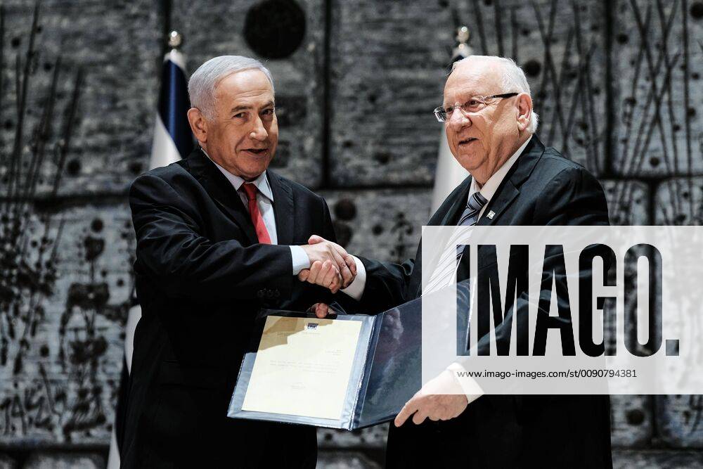 Jerusalem, Israel - Israeli President REUVEN RIVLIN (R) signs a letter of appointment tasking incumbent Prime Minister BENJAMIN NETANYAHU (L) with formation of the next coalition government following April 9th, 2019 elections. Netanyahu s Likud party won 35 of 120 parliament seats in a tie with Blue and White party but has best chance to succeed in forming a coalition based on President s consultations with representatives of all elected parties. Netanyahu has 28 days with a possible 14 day extension to establish government which he will lead in his 5th term as prime minister. Jerusalem Israel - ZUMAa126 20190417_zap_a126_001