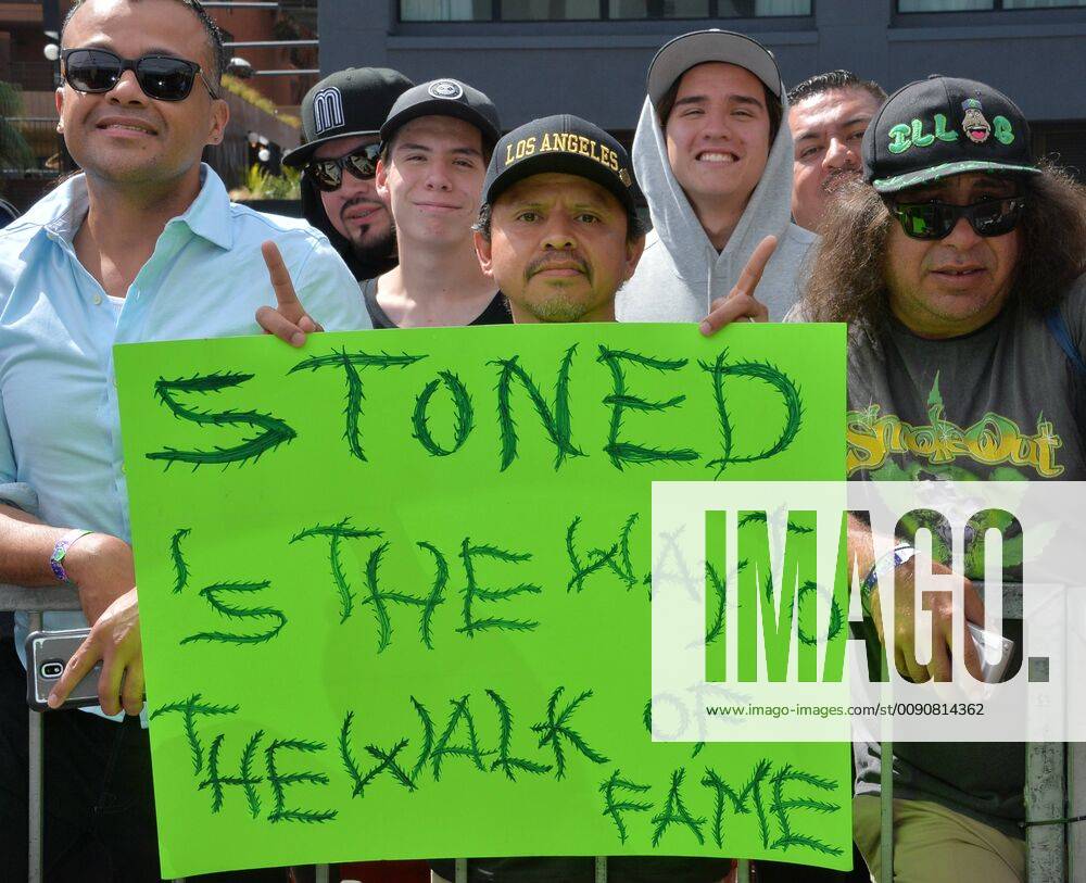 Fans attend the Hollywood Walk of Fame unveiling ceremony honoring Latino American hip-hop group Cypress Hill with the 2,660th star on the Hollywood Walk of Fame in Los Angeles on April 18, 2019. LAP2019041813 JIMxRUYMEN