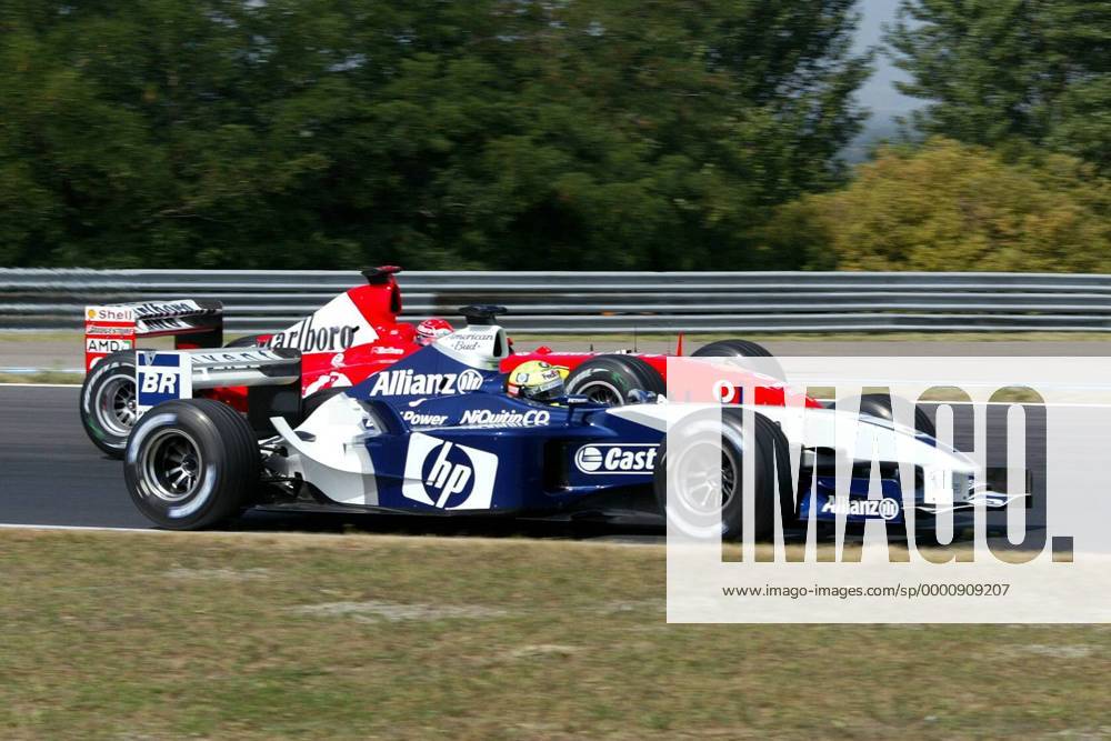 Ralf Schumacher (BMW-Williams) vor seinem Bruder Michael Schumacher (Ferrari beide Deutschland) Motorsport Grand Prix Herren Großer Preis von Ungarn 2003, Formel 1 Weltmeisterschaft, F1, F, GP, WM, Vdig Gruppe Hungaroring Budapest