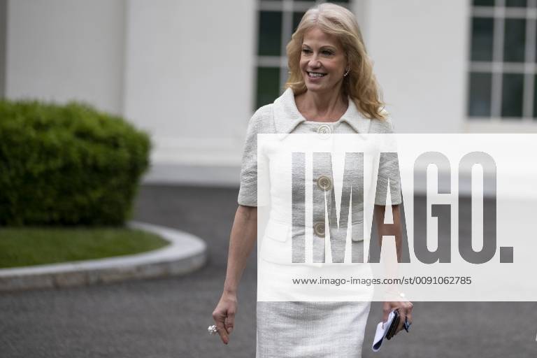Washington, District of Columbia, U.S. - Kellyanne Conway, counselor to United States President Donald Trump, walks out of the West wing of the White House with an aid prior to speaking with members of the media in the West wing driveway at the White House in Washington, D.C. on May 1, 2019. Credit: CNP Washington U.S. - ZUMAs152 20190501_zaa_s152_005