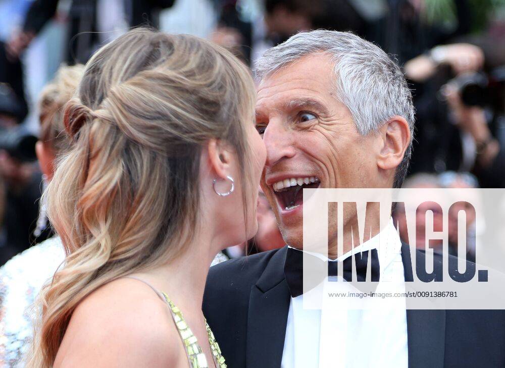Nagui Fam (R) and Melanie Page arrive on the red carpet before the screening of the film Les plus belles annees d une vie at the 72nd annual Cannes International Film Festival in Cannes, France on May 18, 2019. PAR201905187076 DAVIDxSILPA
