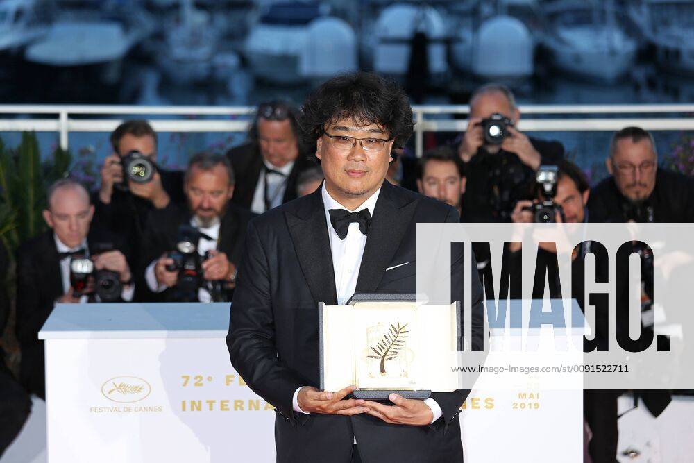 Bong Joon-ho arrives at the award photocall after receiving the Palme d Or prize for the film Parasite during the 72nd annual Cannes International Film Festival in Cannes, France on May 25, 2019. PAR201905257026 DAVIDxSILPA