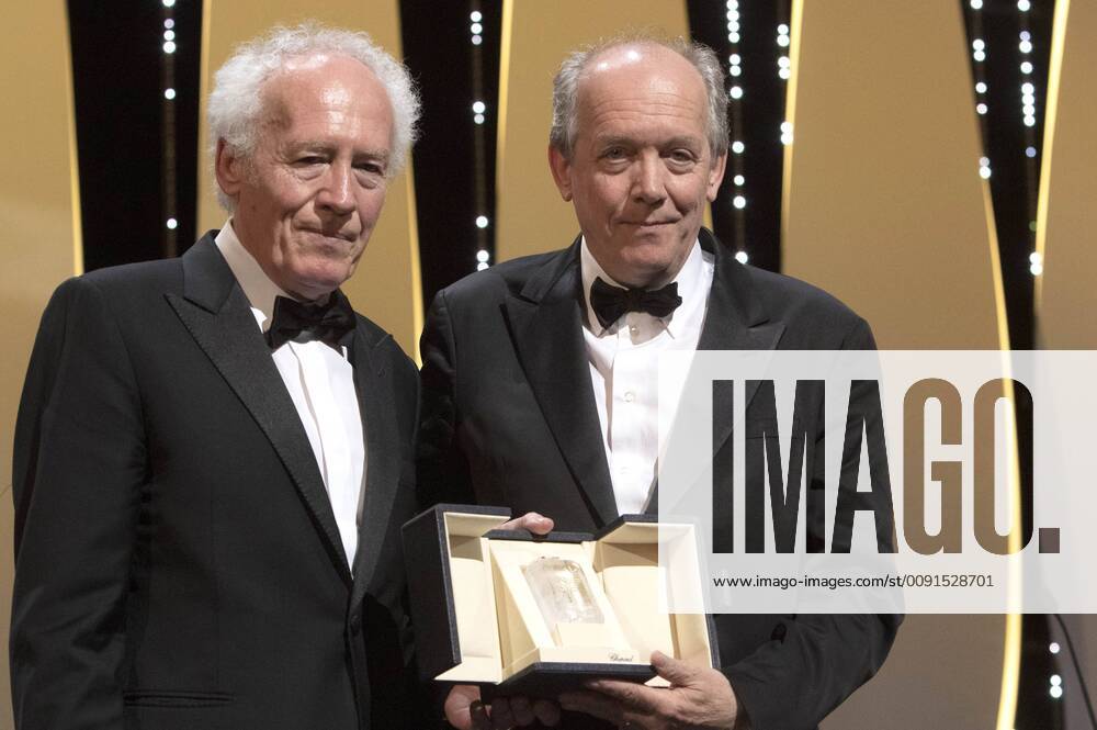 Jean-Pierre Dardenne and Luc Dardenne accept the Best Director Award for their movie Le Jeune Ahmed Young Ahmed at the award ceremony during the 72nd Cannes Film Festival at the Palais des Festivals on May 25, 2019 in Cannes, France
