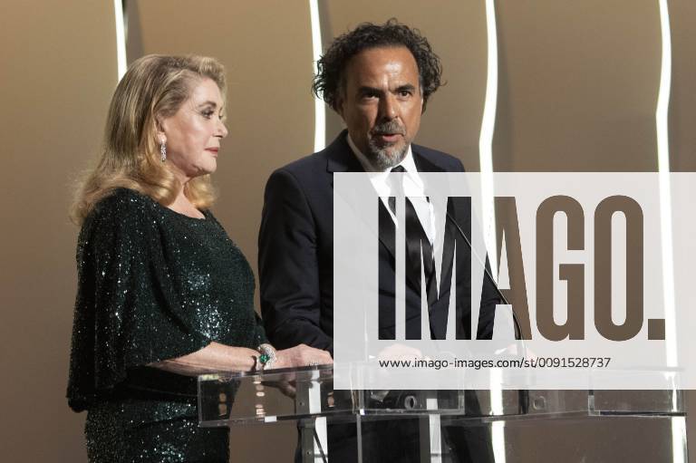 Catherine Deneuve and Alejandro Gonzalez Inarritu at the award ceremony during the 72nd Cannes Film Festival at the Palais des Festivals on May 25, 2019 in Cannes, France