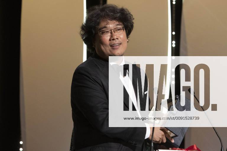 Bong Joon-ho with his Palme d Or (Golden Palm) for the movie Parasite Gisaengchung at the award ceremony during the 72nd Cannes Film Festival at the Palais des Festivals on May 25, 2019 in Cannes, France