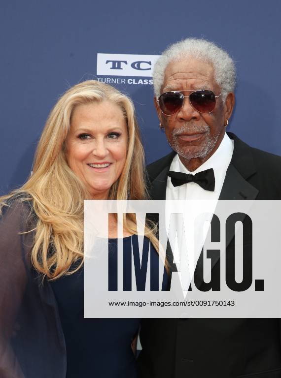HOLLYWOOD, CA - JUNE 6: Lori McCreary, Morgan Freeman, at The American Film Institute s 47th Life Achievement Award Gala Tribute To Denzel Washington at the Dolby Theatre in Hollywood, California on June 6, 2019.