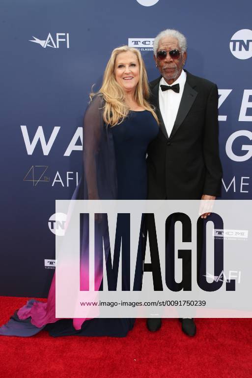 HOLLYWOOD, CA - JUNE 6: Lori McCreary, Morgan Freeman, at The American Film Institute s 47th Life Achievement Award Gala Tribute To Denzel Washington at the Dolby Theatre in Hollywood, California on June 6, 2019.