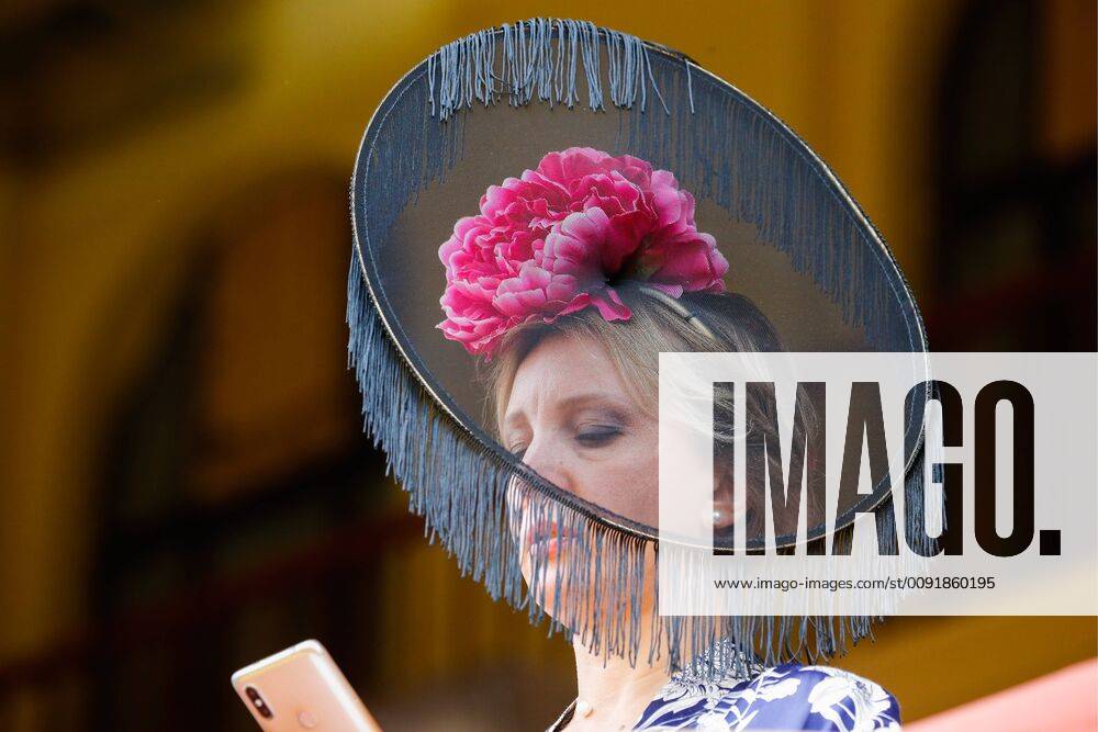 A racegoer wearing a hat at the 2019 Grand Prix Radio Monte Carlo horse race at the Moscow Hippodrome. Sergei Karpukhin TASS TS0AFB17