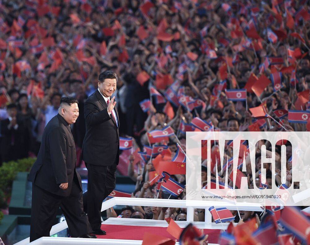 (190620) -- PYONGYANG, June 20, 2019 (Xinhua) -- Xi Jinping, general secretary of the Central Committee of the Communist Party of China (CPC) and Chinese president, and his wife Peng Liyuan, accompanied by Kim Jong Un, chairman of the Workers Party of Korea (WPK) and chairman of the State Affairs Commission of the Democratic People s Republic of Korea (DPRK) and his wife Ri Sol Ju, watch a large group callisthenics and art performance at the May Day Stadium in Pyongyang, DPRK, June 20, 2019. (Xinhua Yan Yan) Pyongyang CHINA