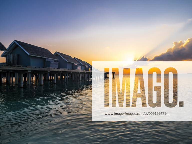 Maledives, Ross Atoll, water bungalows at sunset AMF06907