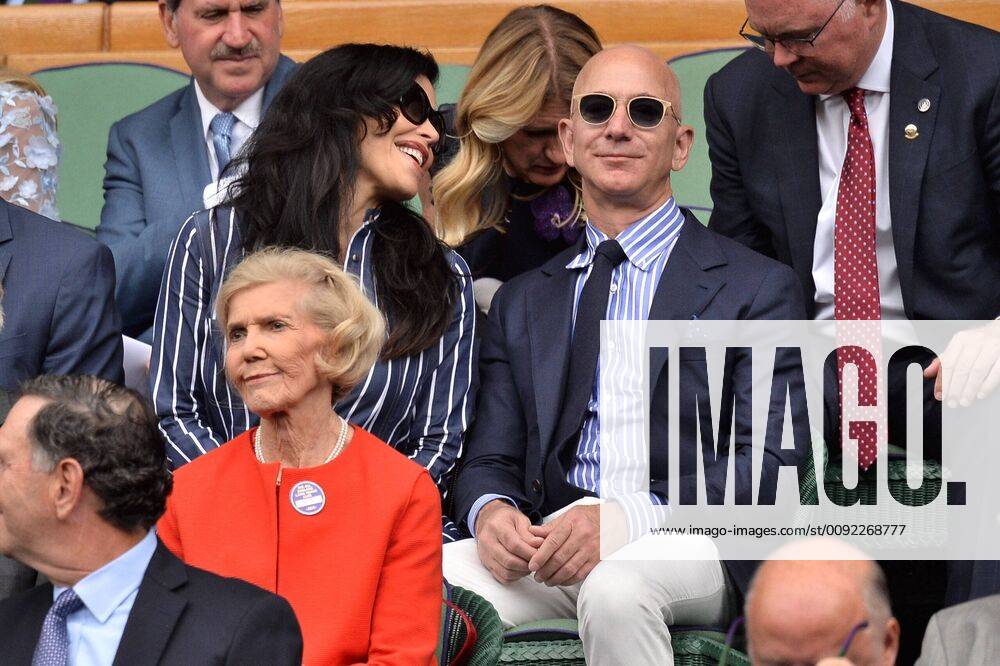 London, London, UK - London, UK. CEO and president of Amazon. com Jeff Bezos and Lauren Sanchez arrive to watch the mens singles finals on centre court tennis on Day 13 of the Wimbledon Tennis Championships 2019 held at the All England Lawn Tennis and Croquet Club. London UK - ZUMAl94_ 20190714_zaf_l94_032