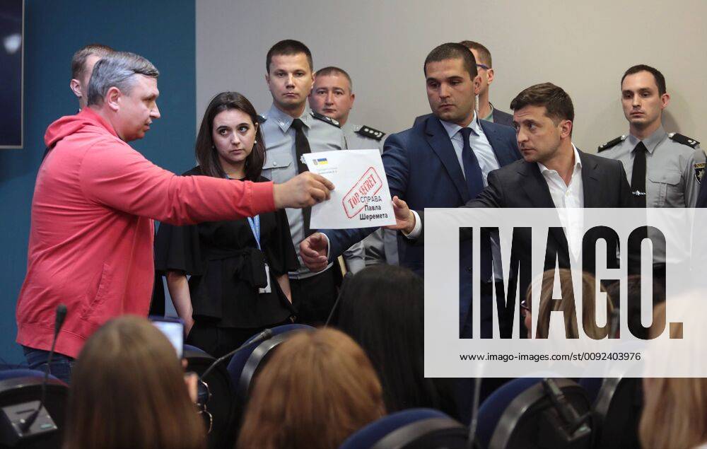 President of Ukraine Volodymyr Zelenskyy (R) attends the presentation of a report on the progress of the investigation into the murder of journalist Pavel Sheremet, Kyiv, capital of Ukraine, July 23, 2019. A reported, Pavel Sheremet died in a car blast which took place at the intersection of Bohdana Khmelnytskoho and Ivana Franka Streets in Kyiv at 7:45 a.m. local time on July 20, 2016. Ukrinform. President Volodymyr Zelenskyy hears out report on Pavel Sheremet murder investigation