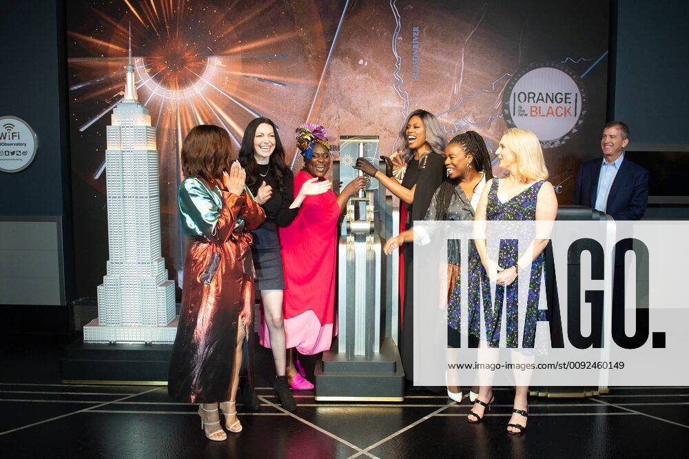 New York, NY, USA: The cast of Netflix s Orange Is The New Black including LAURA PREPON, DASCHA POLANCO, DANIELLE BROOKS, writer PIPER KERMAN, LAVERNE COX and UZO ADUBA light the Empire State Building orange to commemorate the founding of the Poussey Washington Fund on July 26, 2019 in New York. New York USA - ZUMAb148 20140126_zap_b148_011